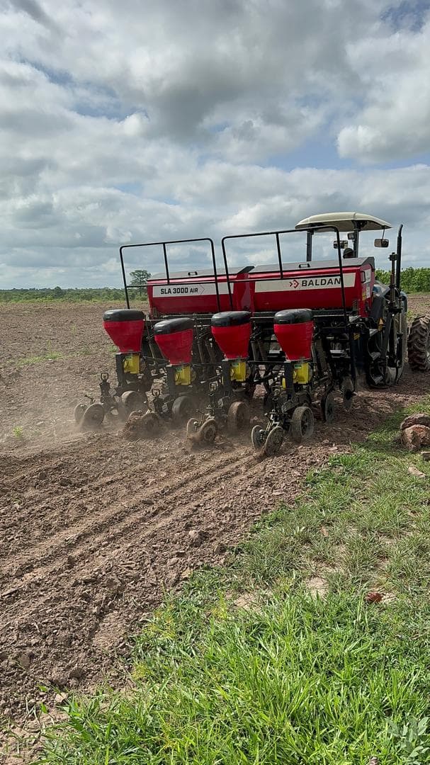 Baldan SLA 3000 AIR precision planter actively working across Aframso farmland, dust rising from prepared soil